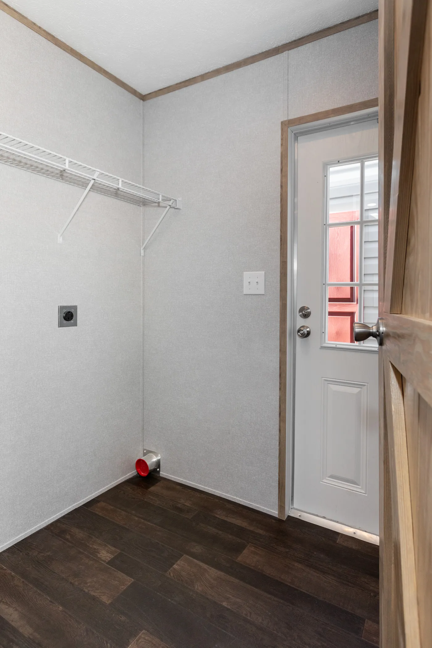 The THE 1959 Utility Room. This Manufactured Mobile Home features 3 bedrooms and 2 baths.