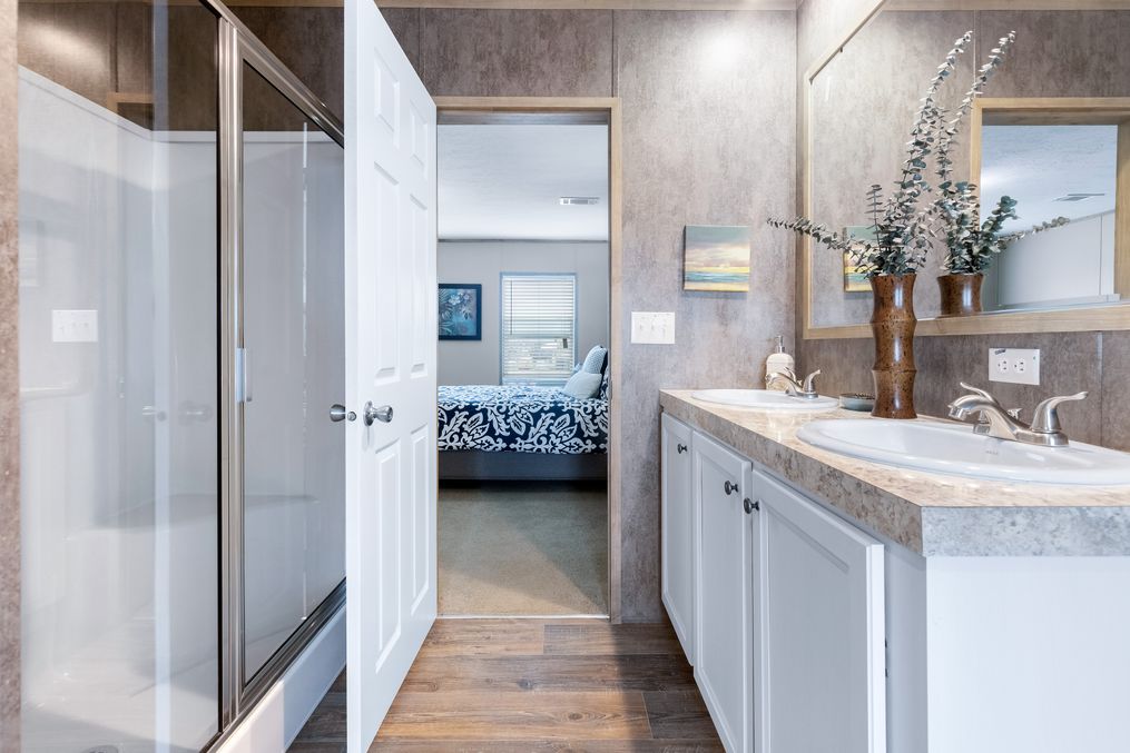 The BIG TICKET Master Bathroom. This Manufactured Mobile Home features 4 bedrooms and 2 baths.