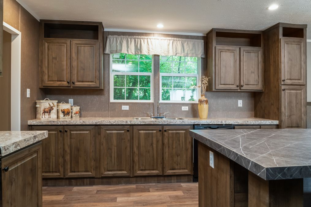 The TRADITION 3268B Kitchen. This Manufactured Mobile Home features 5 bedrooms and 3 baths.