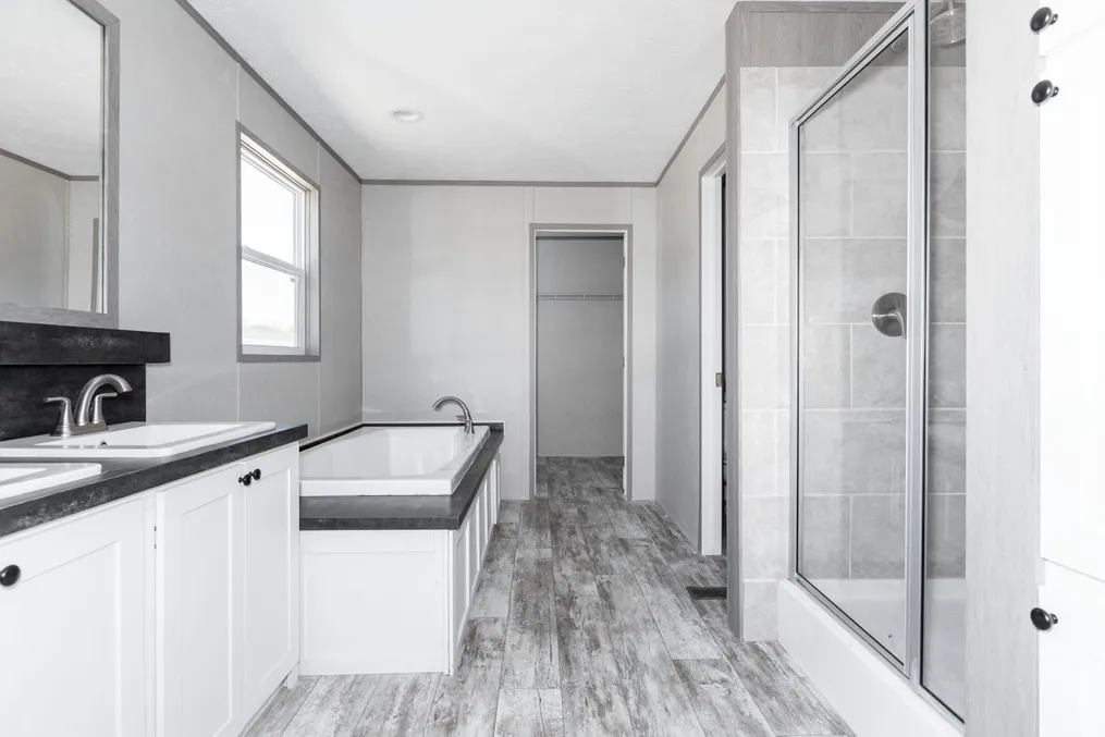 The DIAMOND Primary Bathroom. This Manufactured Mobile Home features 3 bedrooms and 2 baths.