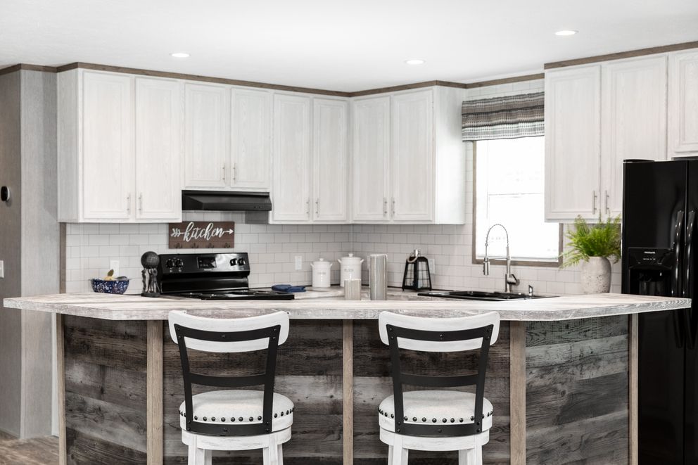 The THE MORRIS Kitchen. This Manufactured Mobile Home features 3 bedrooms and 2 baths.