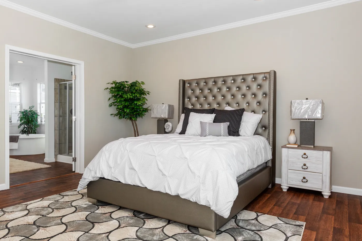 The NORMANDY Primary Bedroom. This Manufactured Mobile Home features 3 bedrooms and 2 baths.