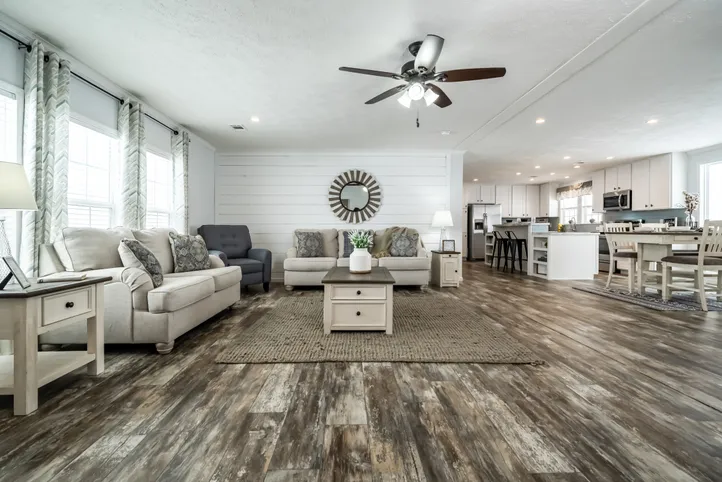 The THE LEAHY Living Room. This Manufactured Mobile Home features 4 bedrooms and 2 baths.