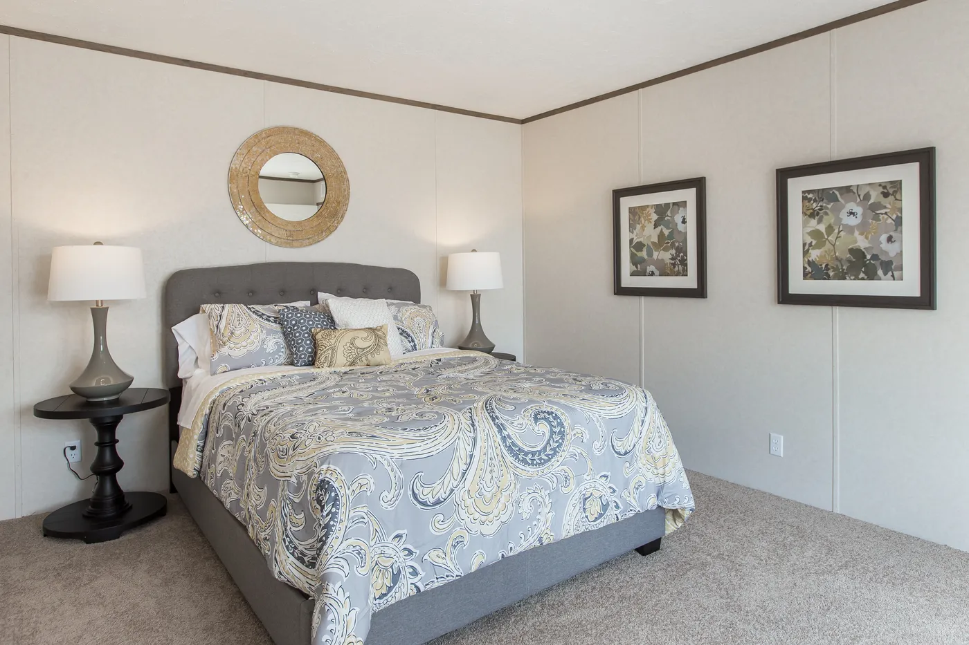 The THE BREEZE Primary Bedroom. This Manufactured Mobile Home features 3 bedrooms and 2 baths.