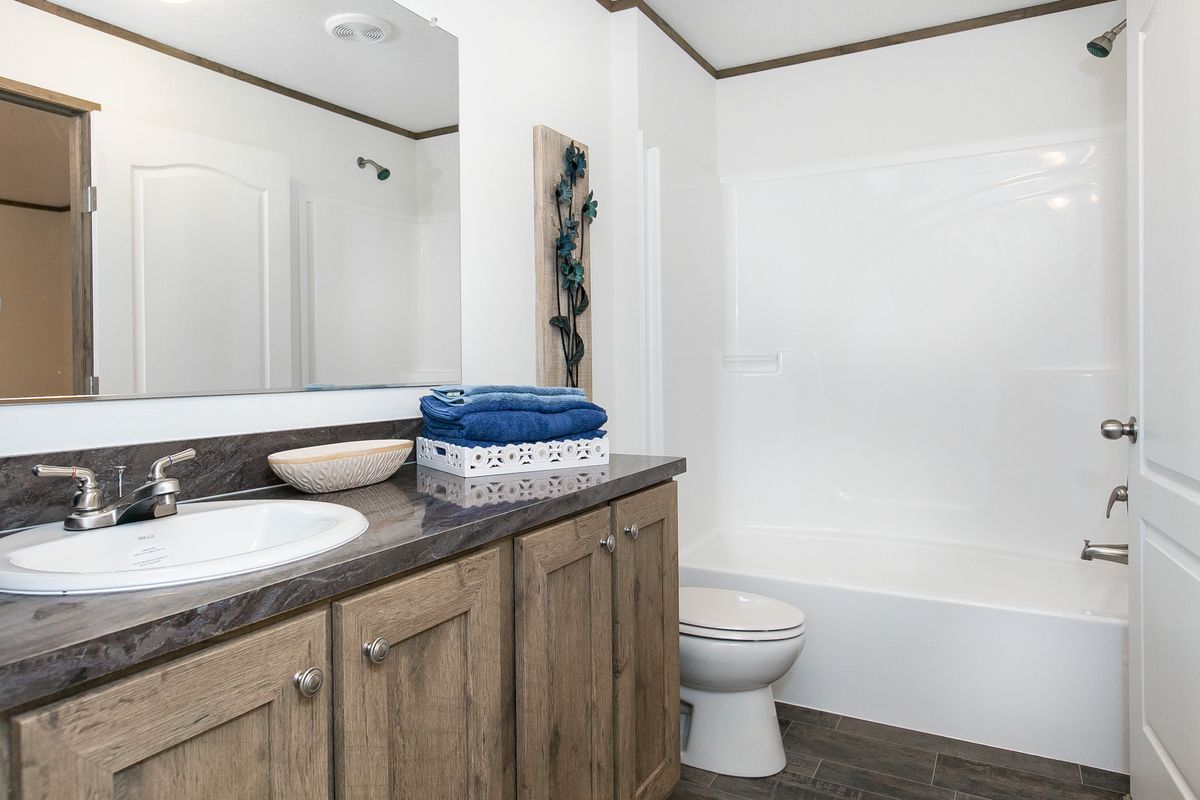 The LIFESTYLE 207 Primary Bathroom. This Manufactured Mobile Home features 3 bedrooms and 2 baths.