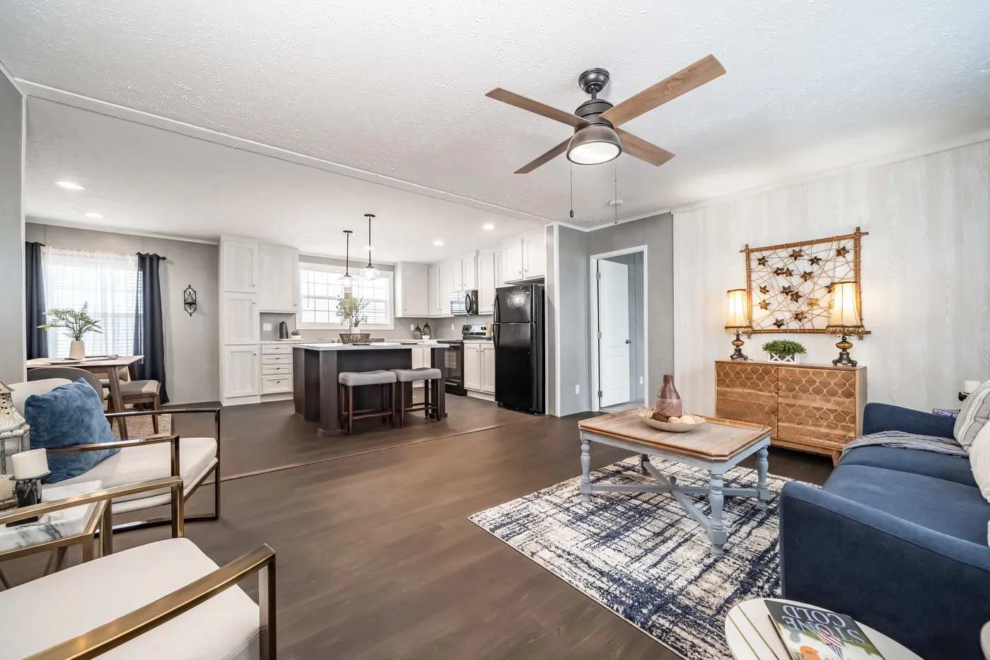 The ULTRA BREEZE 52 Living Room. This Manufactured Mobile Home features 3 bedrooms and 2 baths.