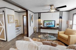 The BREEZE FARMHOUSE 72 Living Room. This Manufactured Mobile Home features 4 bedrooms and 2 baths.