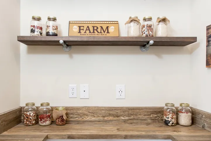 The SOUTHERN CHARM Kitchen. This Manufactured Mobile Home features 3 bedrooms and 2 baths.