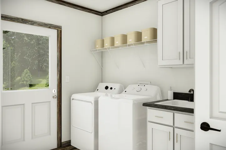 The THE SUMNER Utility Room. This Manufactured Mobile Home features 3 bedrooms and 2 baths.