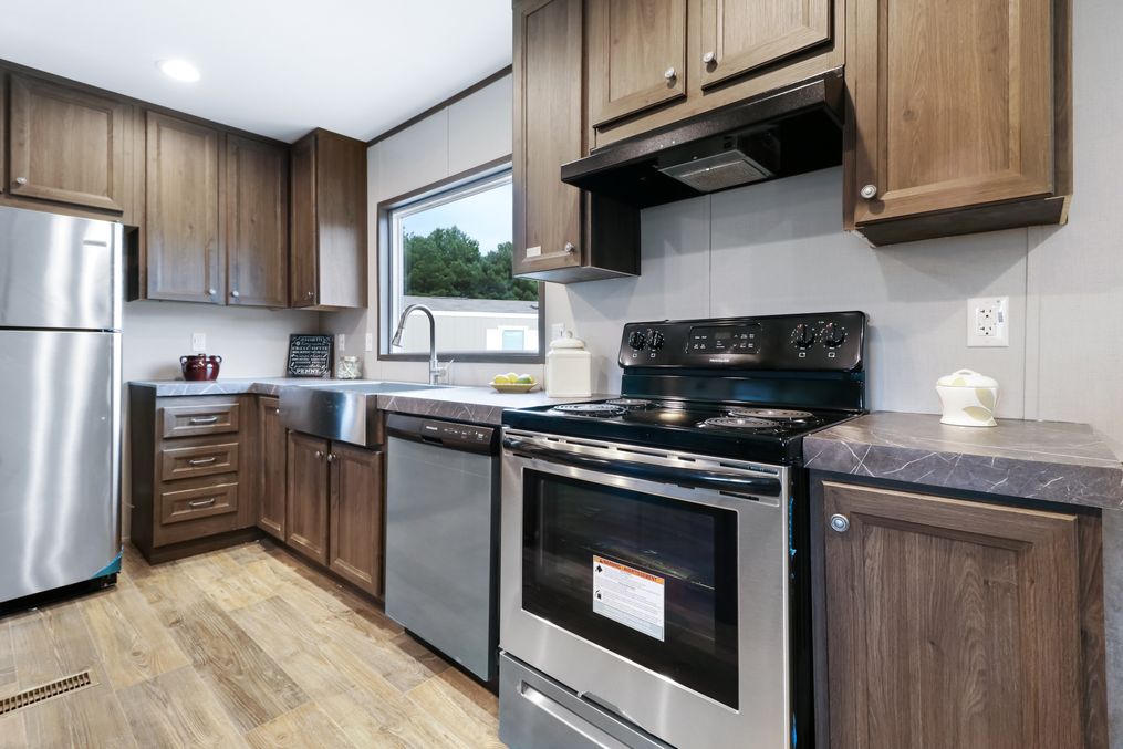 The THE REAL DEAL Kitchen. This Manufactured Mobile Home features 3 bedrooms and 2 baths.