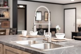 The BOUJEE Kitchen. This Manufactured Mobile Home features 3 bedrooms and 2 baths.