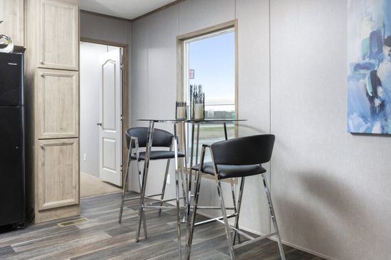 The GULF BREEZE Dining Area. This Manufactured Mobile Home features 3 bedrooms and 2 baths.
