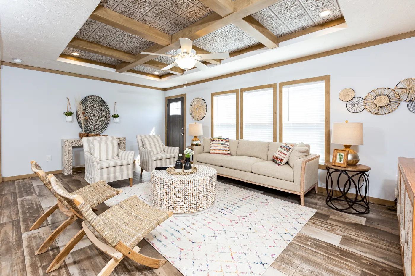 The THE KIMMEL Living Room. This Manufactured Mobile Home features 3 bedrooms and 2 baths.