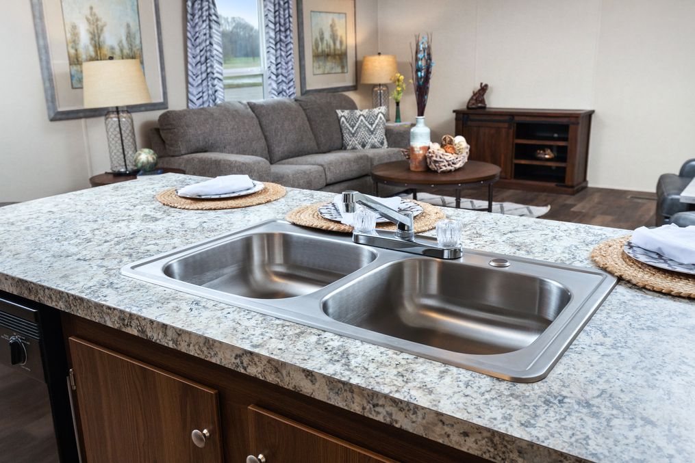 The VICTORY PLUS Kitchen. This Manufactured Mobile Home features 3 bedrooms and 2 baths.