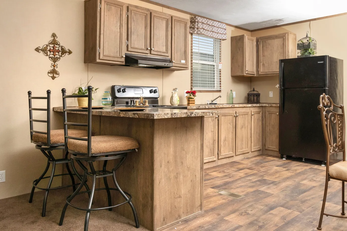 The THE HANCOCK Kitchen. This Manufactured Mobile Home features 2 bedrooms and 2 baths.