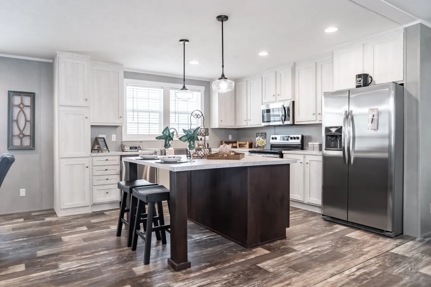 The ULTRA BREEZE 52 Kitchen. This Manufactured Mobile Home features 3 bedrooms and 2 baths.
