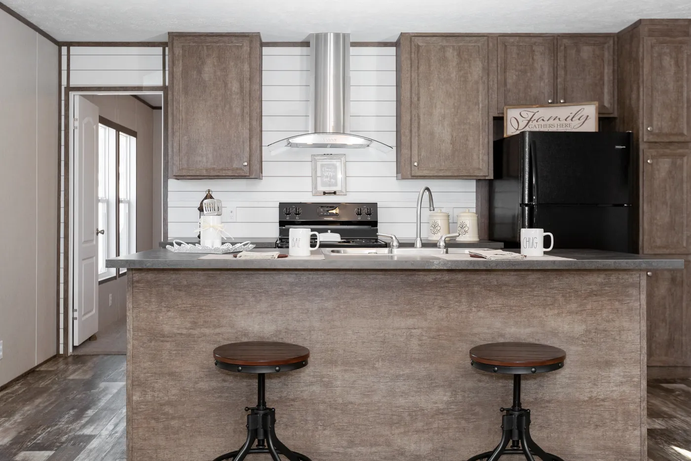 The THE BREEZE Kitchen. This Manufactured Mobile Home features 3 bedrooms and 2 baths.