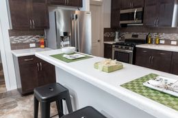The K3060A Kitchen. This Manufactured Mobile Home features 3 bedrooms and 2 baths.