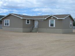 The HALLMARK PLUS Exterior. This Manufactured Mobile Home features 3 bedrooms and 3 baths.