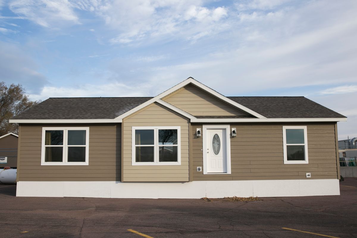 The INTEGRITY 98 MOD Exterior. This Manufactured Mobile Home features 2 bedrooms and 2 baths.