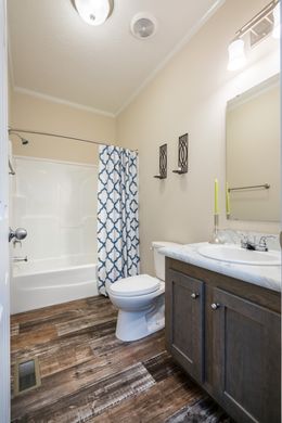 The 2062 CLASSIC Guest Bathroom. This Manufactured Mobile Home features 3 bedrooms and 2 baths.