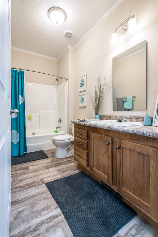 The 2914 HERITAGE Guest Bathroom. This Manufactured Mobile Home features 3 bedrooms and 2 baths.