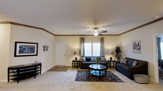 The 2917 HERITAGE Living Room. This Manufactured Mobile Home features 4 bedrooms and 2 baths.