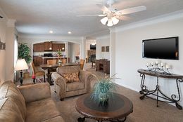 The 4707 ROCKETEER 7 7632 Living Room. This Manufactured Mobile Home features 4 bedrooms and 2 baths.