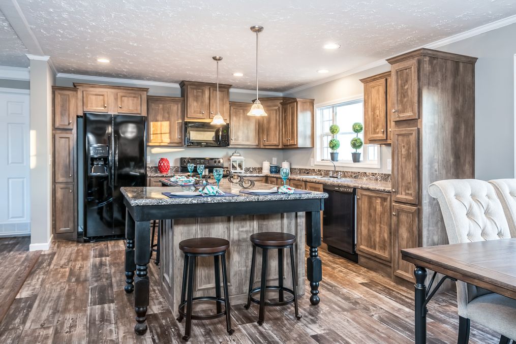 The 5607 ENTERPRISE 7228 Kitchen. This Manufactured Mobile Home features 4 bedrooms and 2 baths.