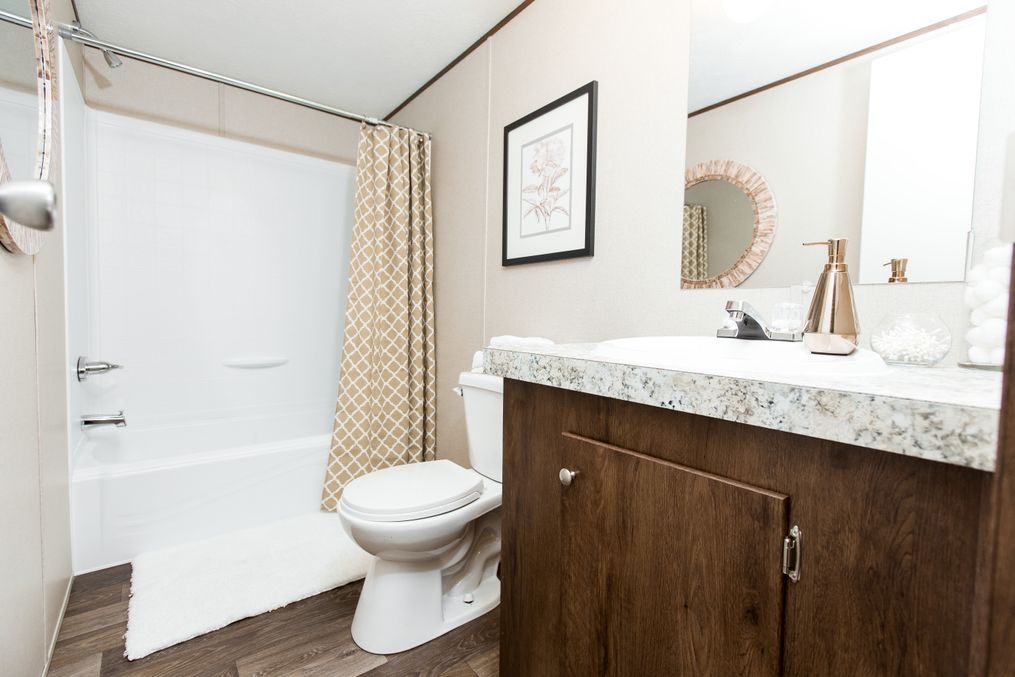 The BLISS Guest Bathroom. This Manufactured Mobile Home features 2 bedrooms and 1 bath.