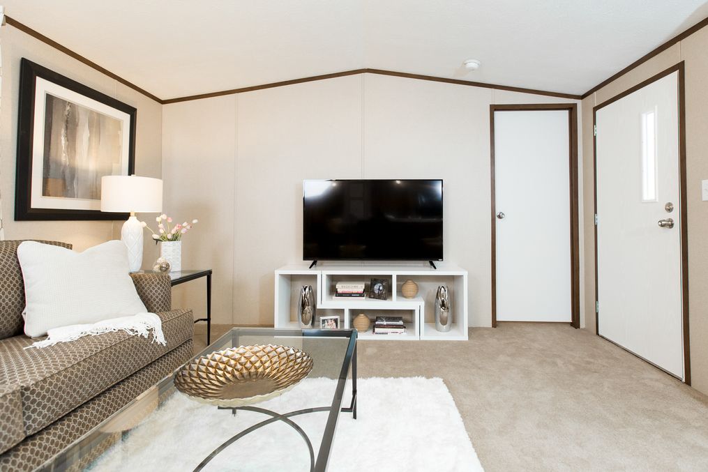 The BLISS Living Room. This Manufactured Mobile Home features 2 bedrooms and 1 bath.