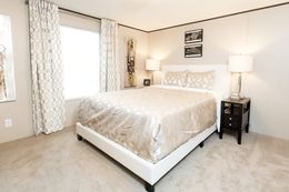 The BLISS Primary Bedroom. This Manufactured Mobile Home features 2 bedrooms and 1 bath.