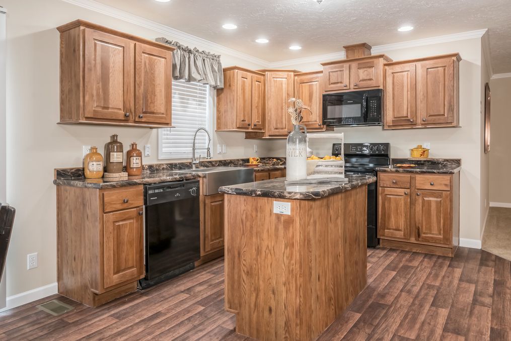 The BROOKLINE FLEX Kitchen. This Manufactured Mobile Home features 4 bedrooms and 2 baths.