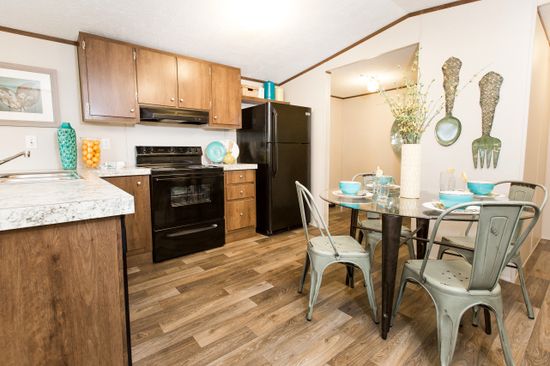 The DELIGHT Kitchen. This Manufactured Mobile Home features 2 bedrooms and 2 baths.