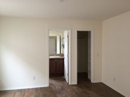 The FAIRPOINT 14602A Primary Bedroom. This Manufactured Mobile Home features 2 bedrooms and 2 baths.
