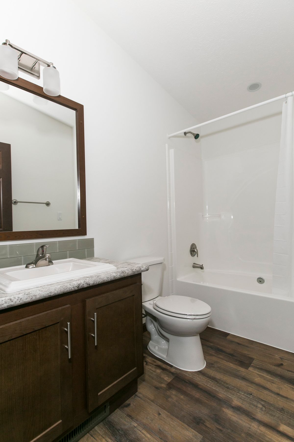 The FREEDOM 405 Guest Bathroom. This Manufactured Mobile Home features 3 bedrooms and 2 baths.