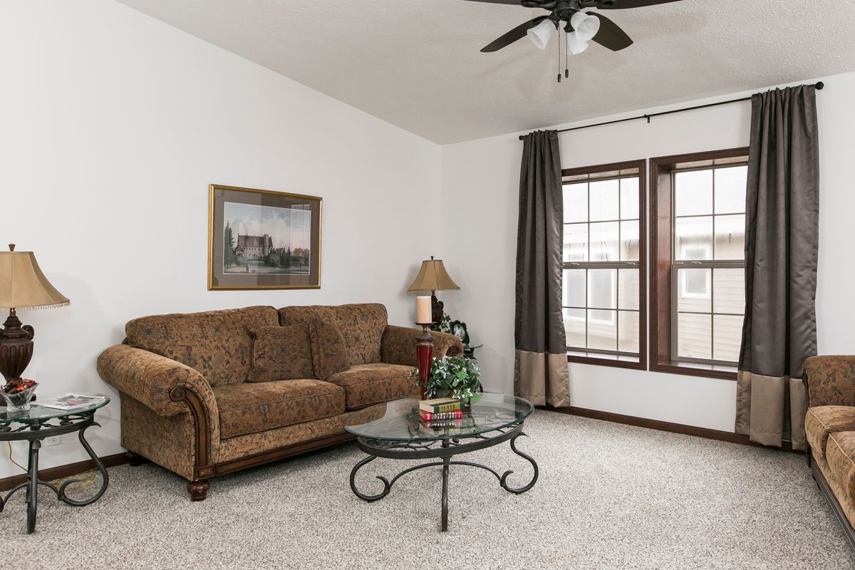 The FREEDOM 405 Living Room. This Manufactured Mobile Home features 3 bedrooms and 2 baths.