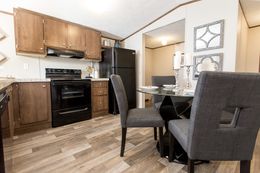 The GLORY Dining Area. This Manufactured Mobile Home features 3 bedrooms and 2 baths.