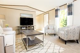 The GLORY Living Room. This Manufactured Mobile Home features 3 bedrooms and 2 baths.