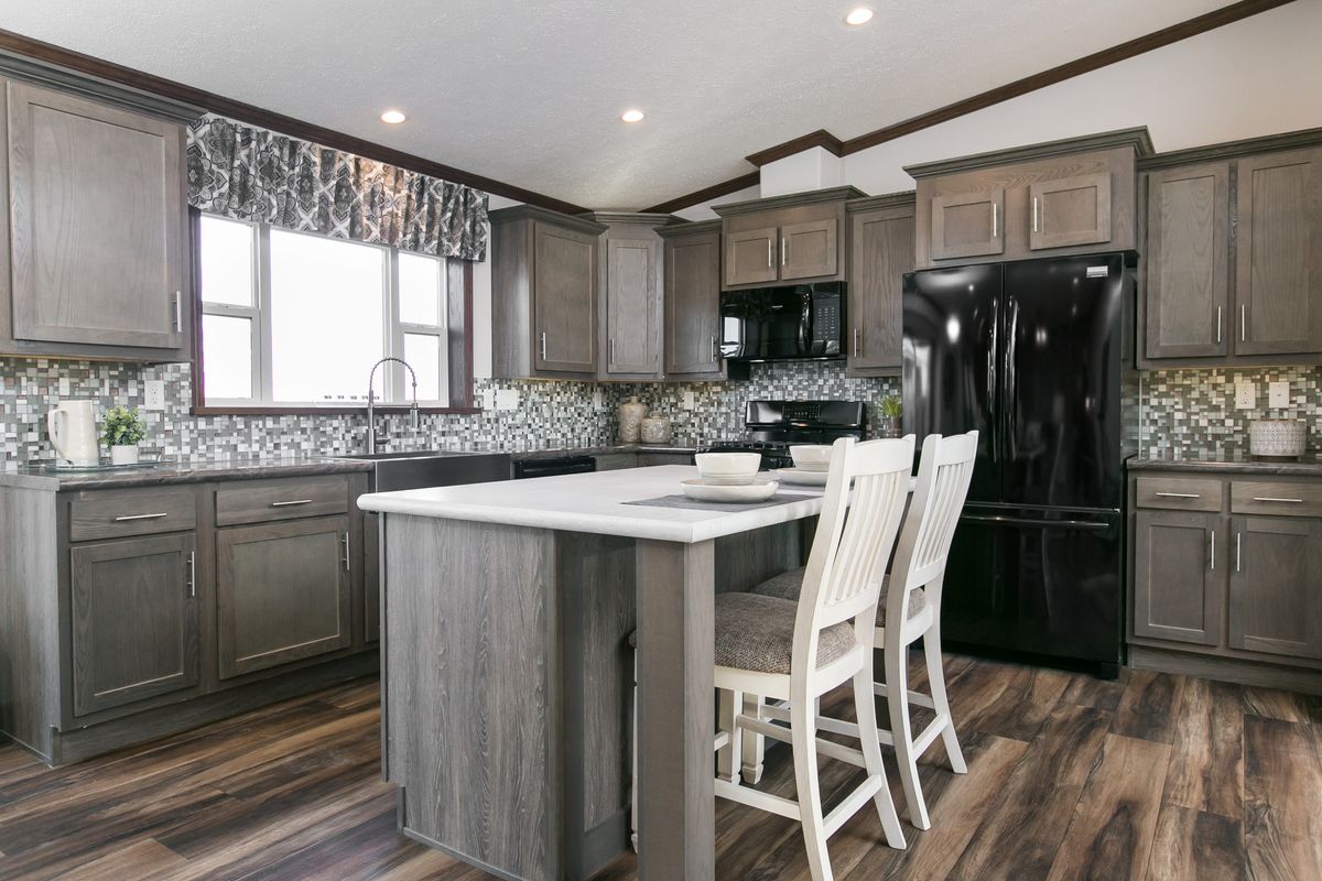 The INDEPENDENCE 29 Kitchen. This Manufactured Mobile Home features 4 bedrooms and 2 baths.