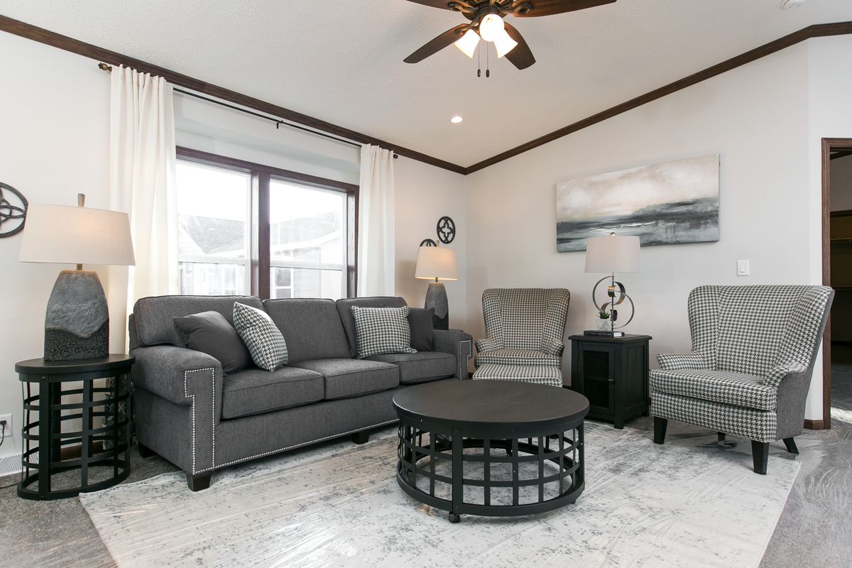 The INDEPENDENCE 29 Living Room. This Manufactured Mobile Home features 4 bedrooms and 2 baths.
