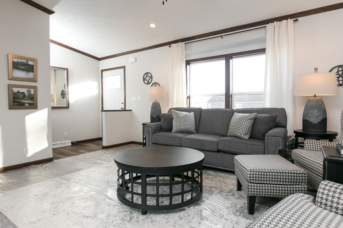 The INDEPENDENCE 29 Living Room. This Manufactured Mobile Home features 4 bedrooms and 2 baths.