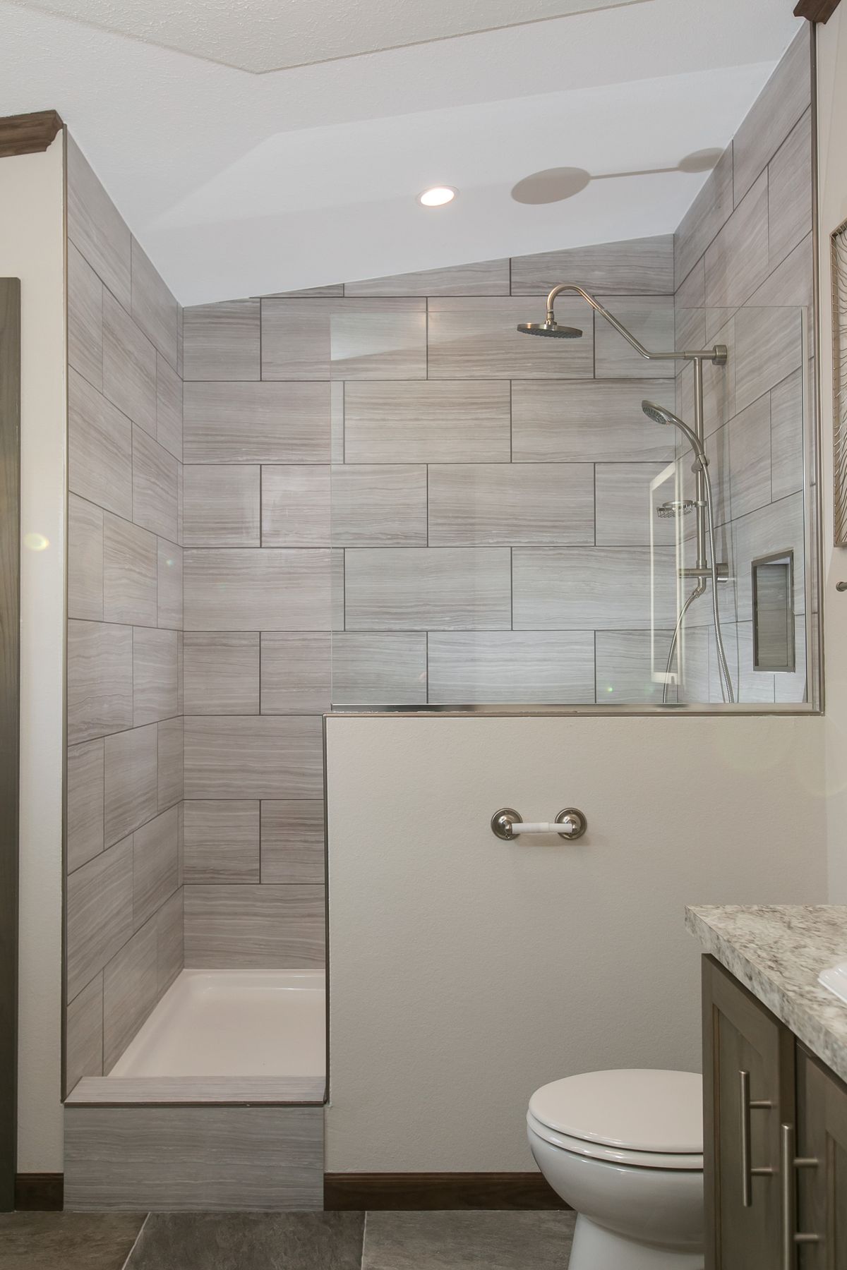 The INDEPENDENCE 29 Primary Bathroom. This Manufactured Mobile Home features 4 bedrooms and 2 baths.