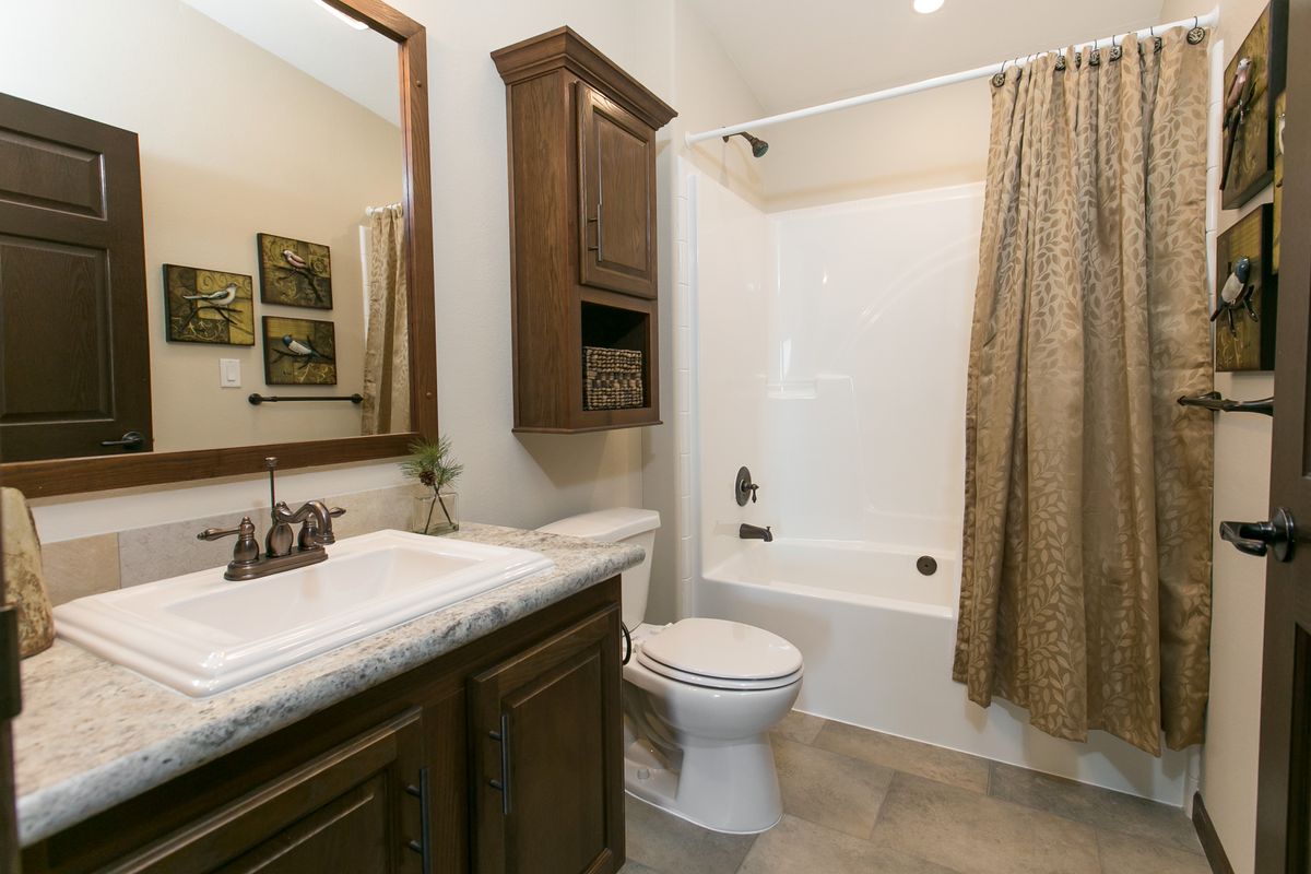 The INTEGRITY 98 MOD Guest Bathroom. This Manufactured Mobile Home features 2 bedrooms and 2 baths.