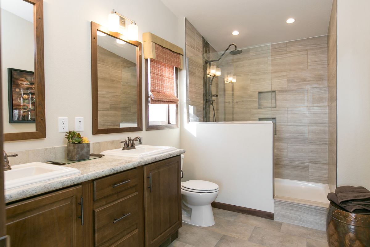 The INTEGRITY 98 MOD Primary Bathroom. This Manufactured Mobile Home features 2 bedrooms and 2 baths.