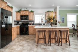 The K3068C Dining Area. This Manufactured Mobile Home features 3 bedrooms and 2 baths.