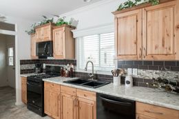 The K3068C Kitchen. This Manufactured Mobile Home features 3 bedrooms and 2 baths.