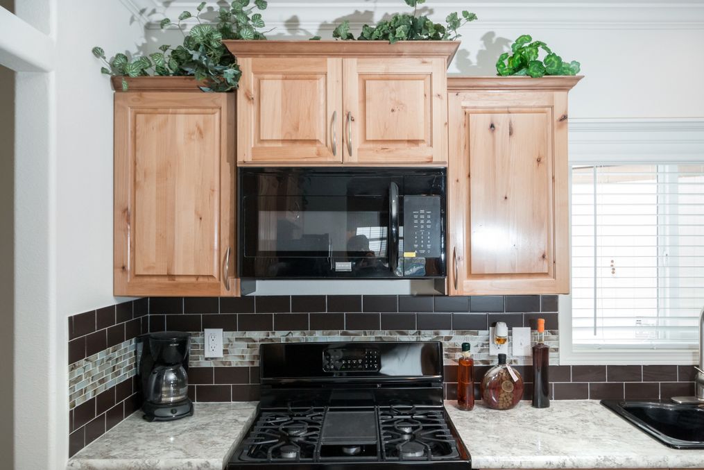 The K3068C Kitchen. This Manufactured Mobile Home features 3 bedrooms and 2 baths.