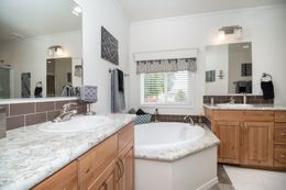 The K3068C Primary Bathroom. This Manufactured Mobile Home features 3 bedrooms and 2 baths.