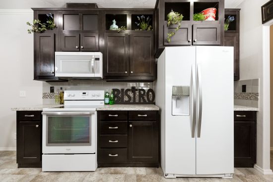 The PREFERRED PLUS CP561F Kitchen. This Manufactured Mobile Home features 3 bedrooms and 2 baths.